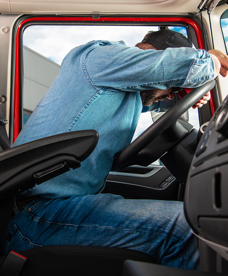 Sleep America has Benefits for Employers. Image of driver asleep at the wheel.